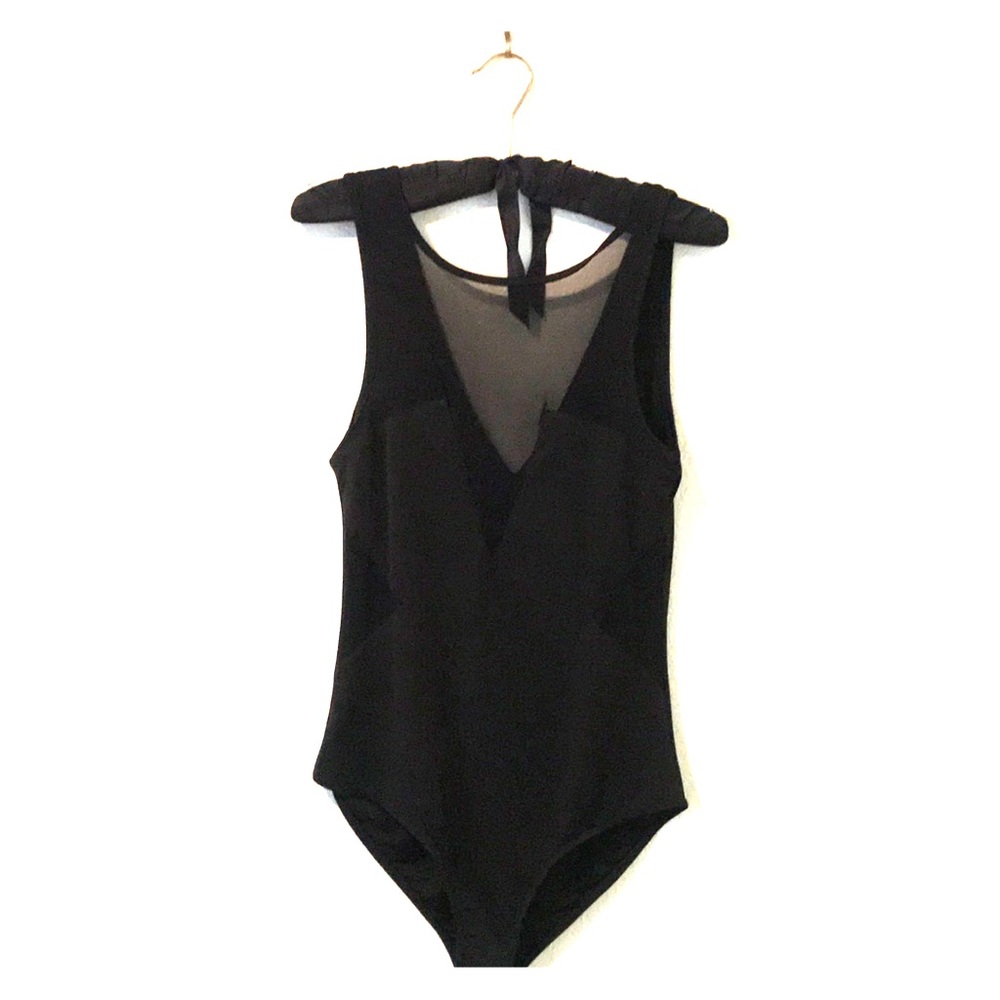Foreign Exchange black body suit